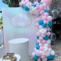 a picture of a mermaid baby shower organized by A&E Keys Balloons Rentals in Florida