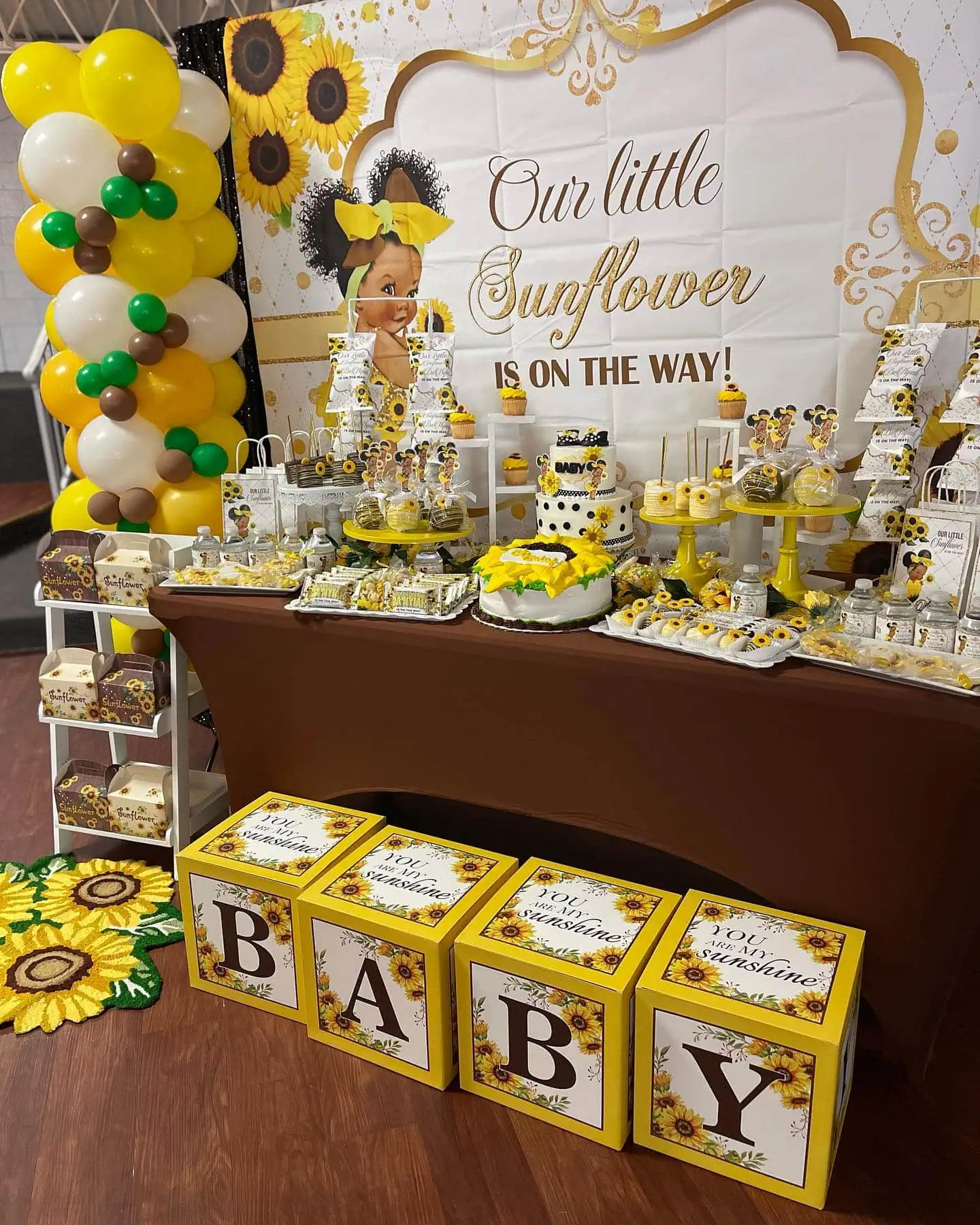 a picture of a sunflower baby shower organized by Tantastic Events