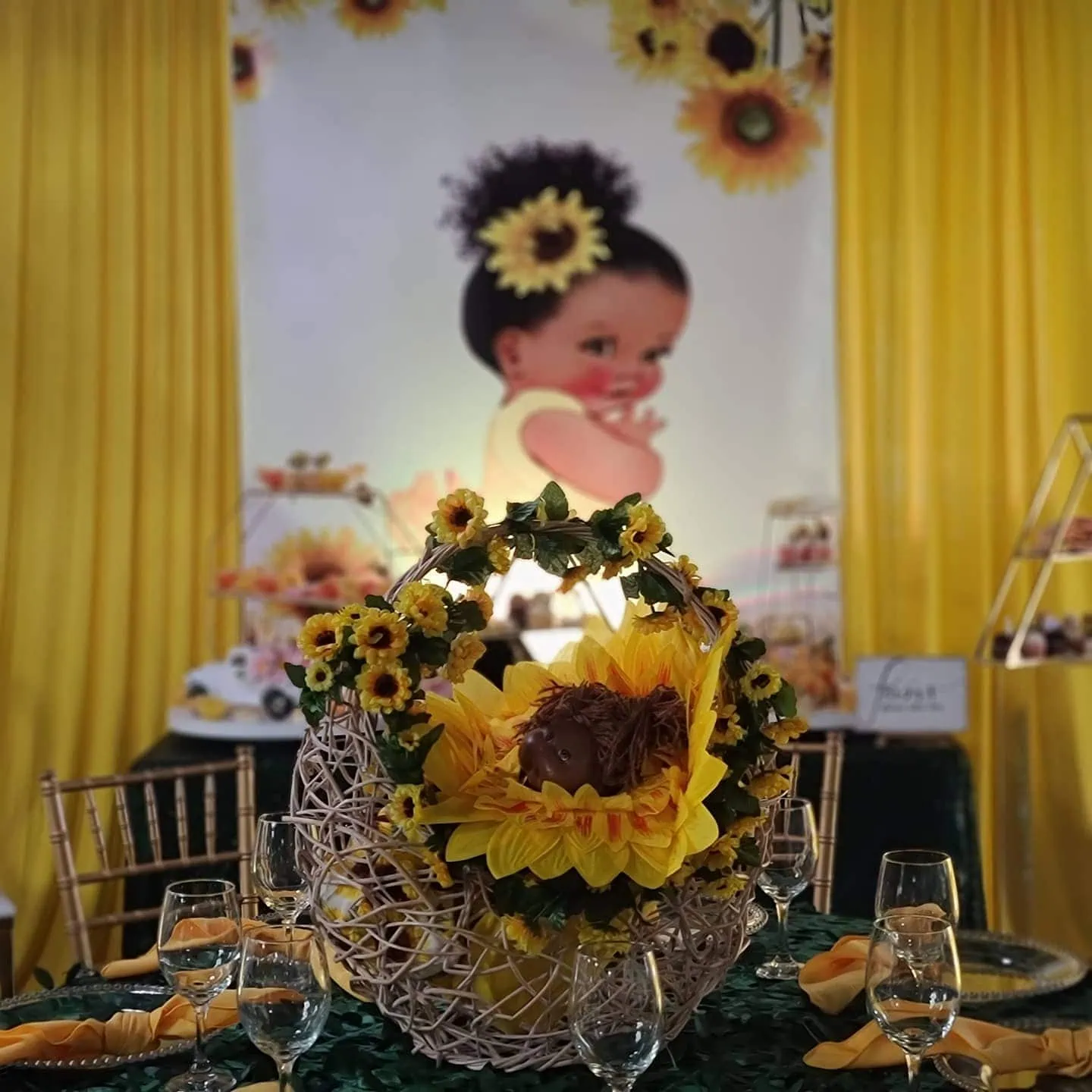 a picture of a sunflower baby shower organized by Tenoia Peppers-Alexander