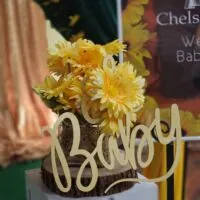 a picture of a sunflower baby shower organized by Tenoia Peppers-Alexander