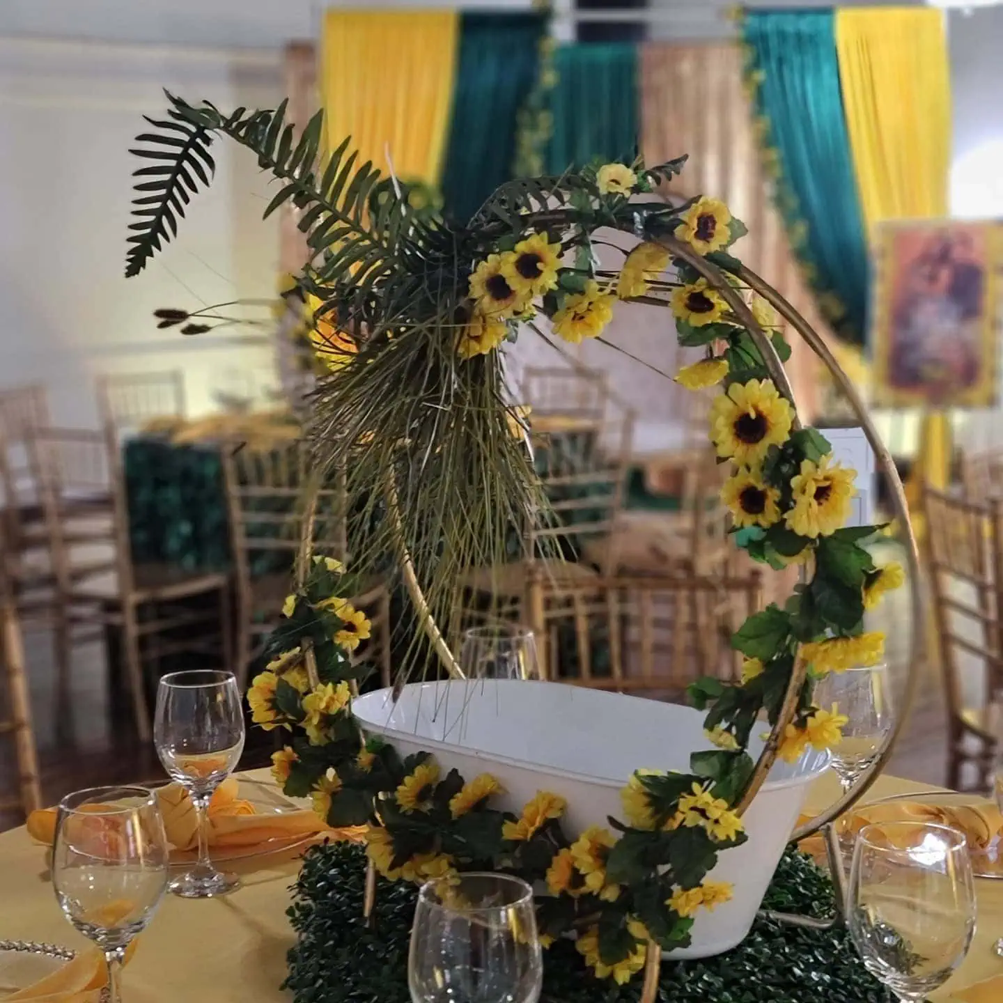 a picture of a sunflower baby shower organized by Tenoia Peppers-Alexander