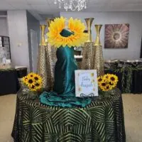 a picture of a sunflower baby shower organized by Tenoia Peppers-Alexander