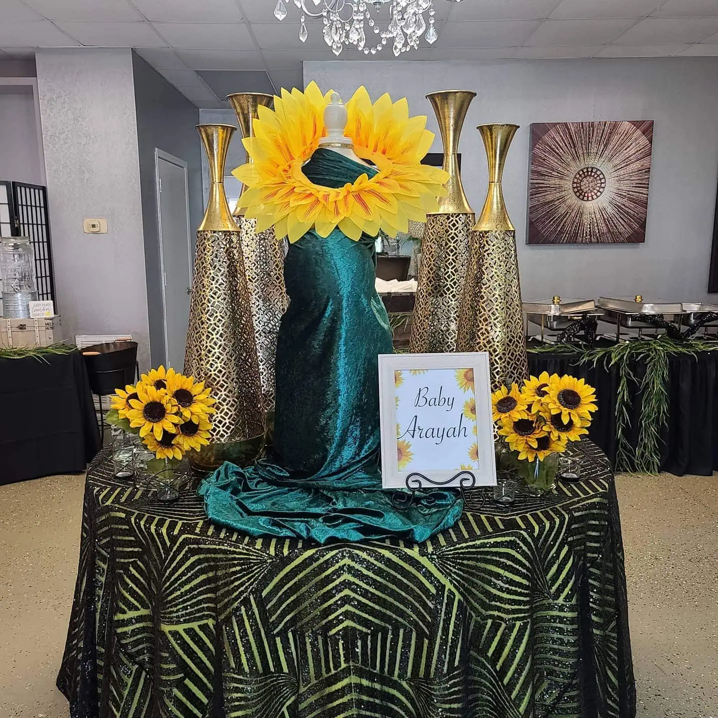 a picture of a sunflower baby shower organized by Tenoia Peppers-Alexander