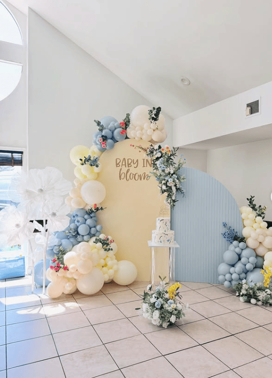 Colorful balloon arch for spring baby shower celebration.