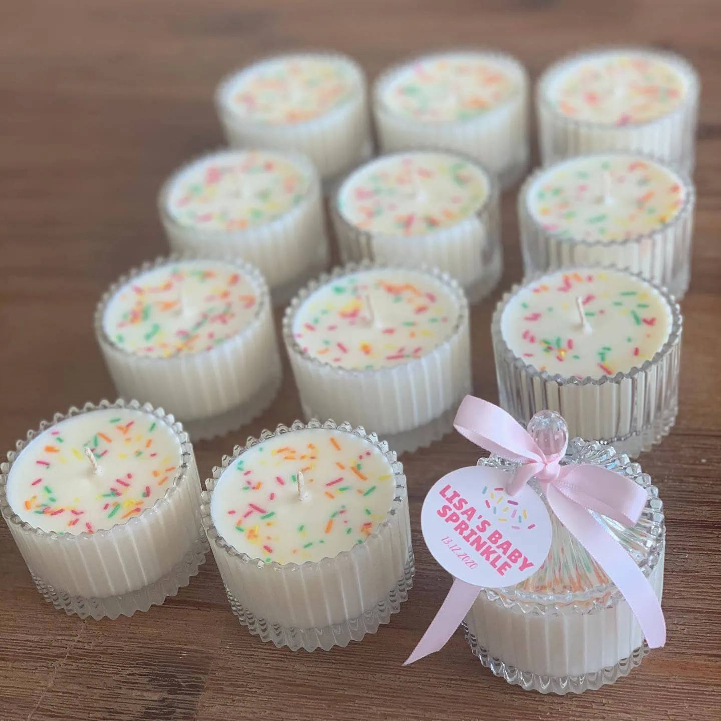 Delicate sprinkle-themed candles with pastel sprinkles, perfect for a second or third baby shower ce.