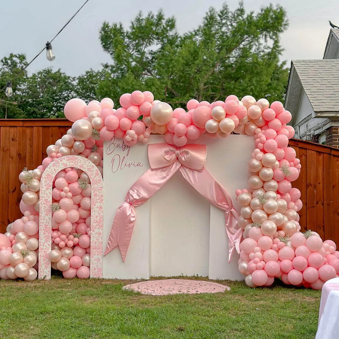 Baby Shower Balloon Arch with Pink and Pearl Balloons for Coquette Theme Celebration.